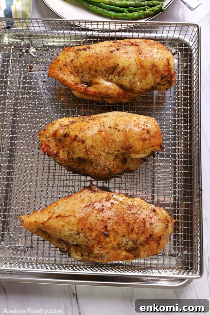 2-Week Family Meal Plan: Simple Recipes & Grocery List 3 Stuffed chicken breast on an air fryer basket.