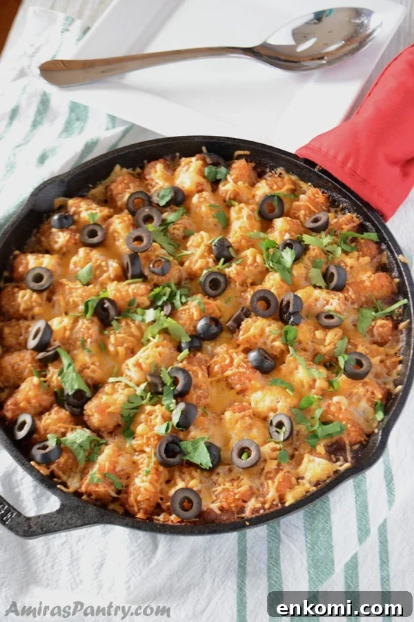 2-Week Family Meal Plan: Simple Recipes & Grocery List 4 A pan with Tater tots, cheese and olives