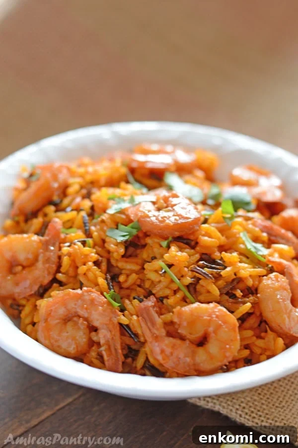 2-Week Family Meal Plan: Simple Recipes & Grocery List 5 A white bowl with wild rice and shrimp.