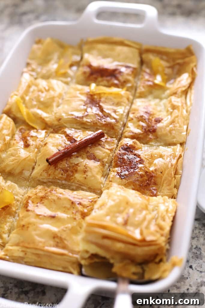 2-Week Family Meal Plan: Simple Recipes & Grocery List 7 Galaktoboureko in a white oven dish.