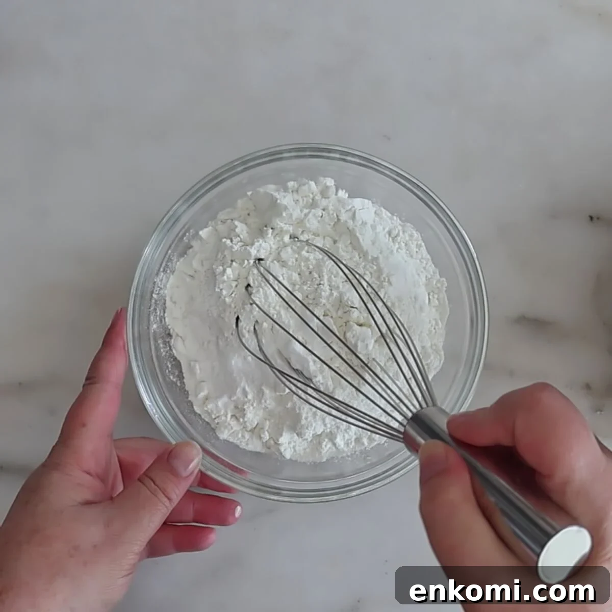 Gluten-Free Churro Cupcakes Recipe with Cinnamon Sugar Topping 6 whisking dry ingredients in small glass bowl.