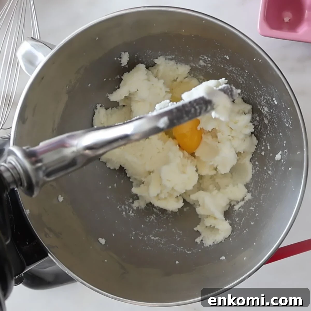 Gluten-Free Churro Cupcakes Recipe with Cinnamon Sugar Topping 8 one egg added to creamed butter and sugar in stainless steel mixer bowl.