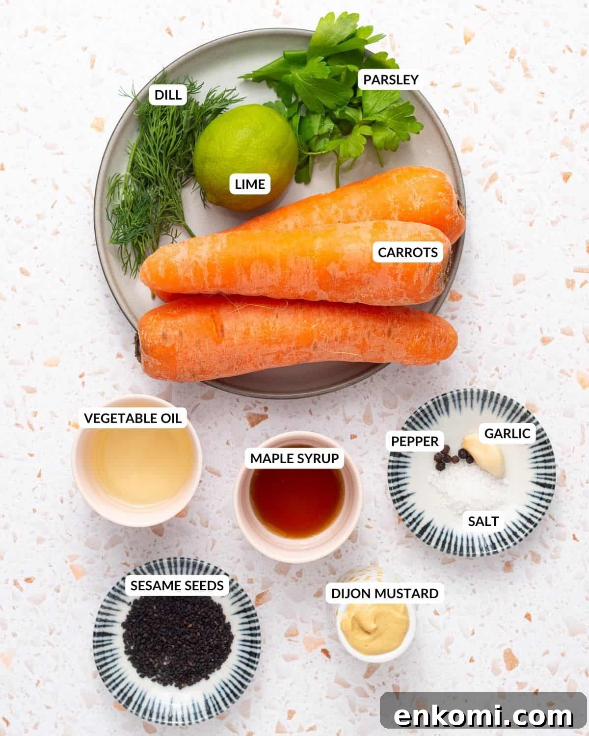 An overhead image of the ingredients of raw carrot salad with labels.