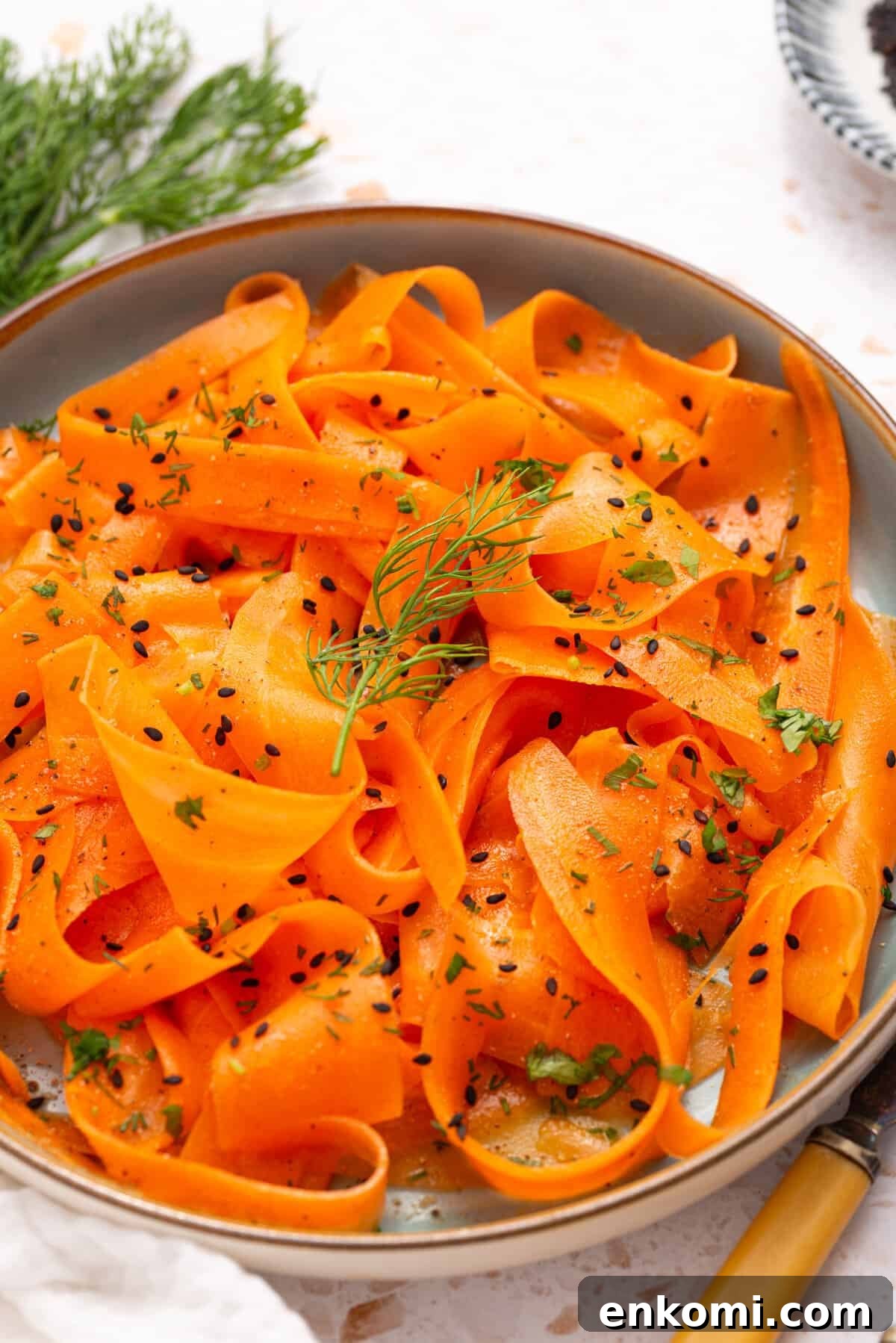 A close up image of raw carrot salad.