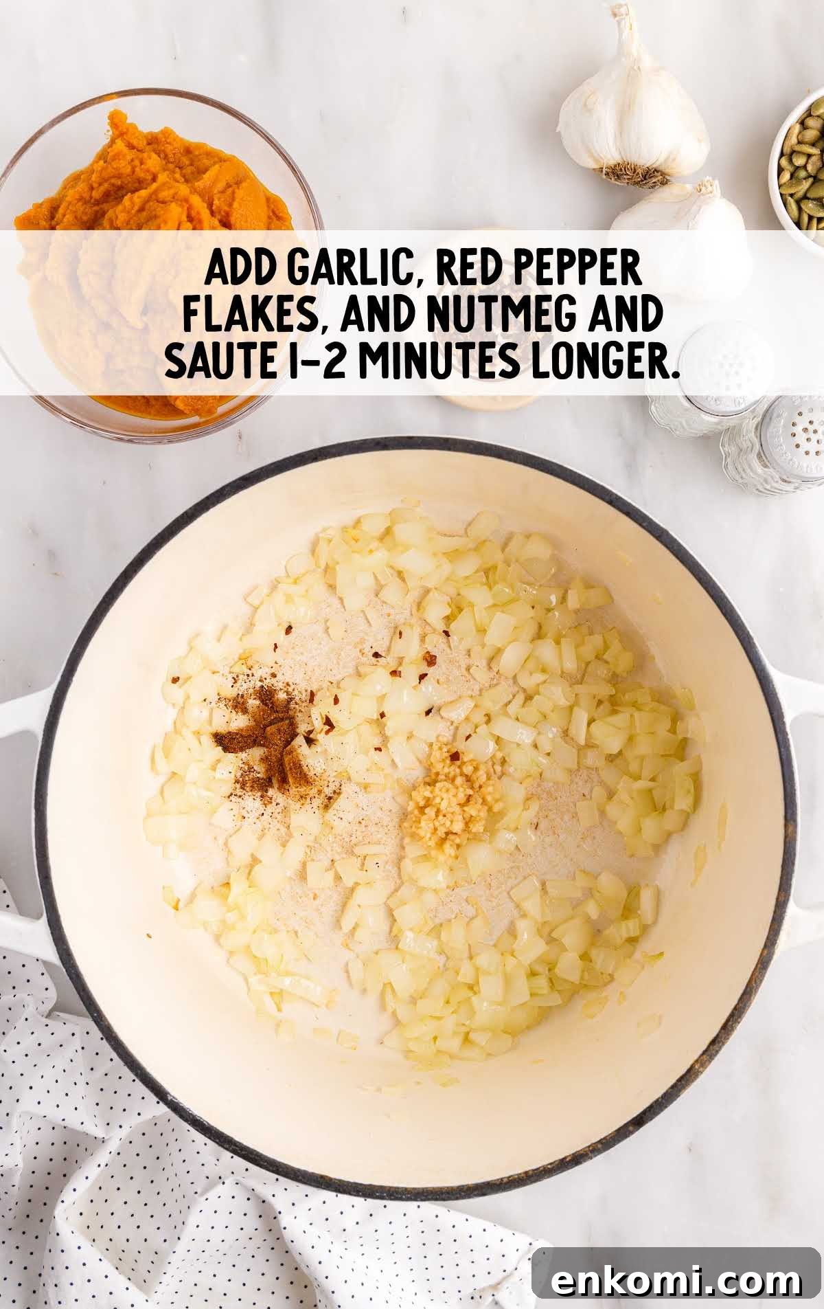 garlic, red pepper, flakes, and nutmeg sauté in a pot