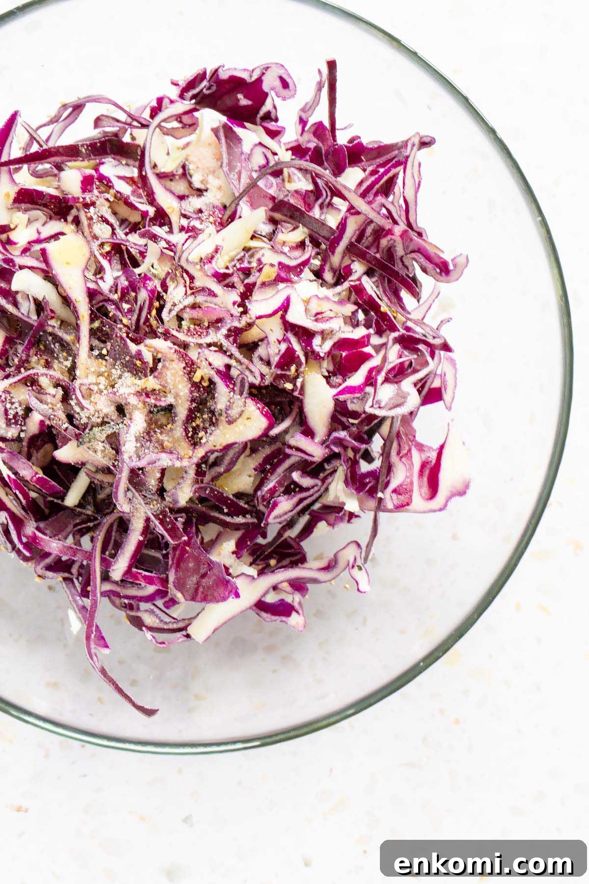 red cabbage with oil in a bowl