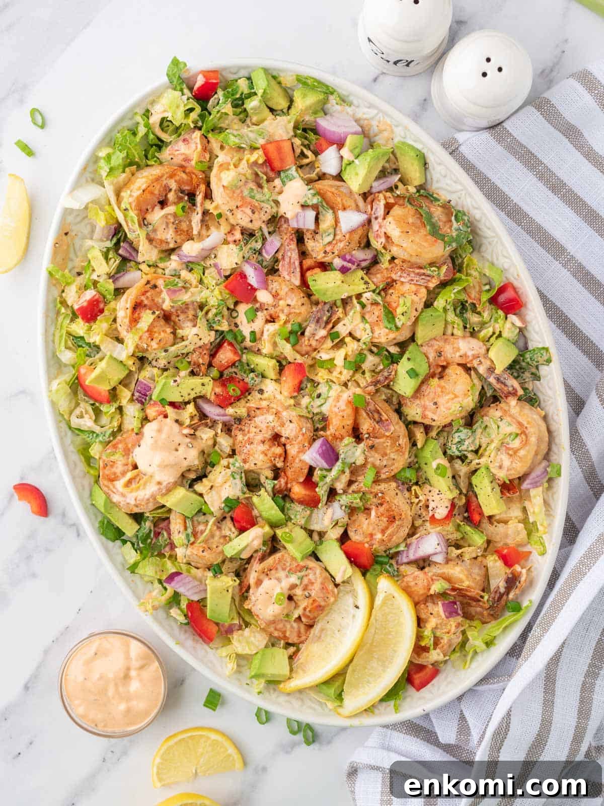 Citrus Shrimp Salad with Crisp Lettuce and Avocado 2 A platter of an easy shrimp salad recipe ready to serve.