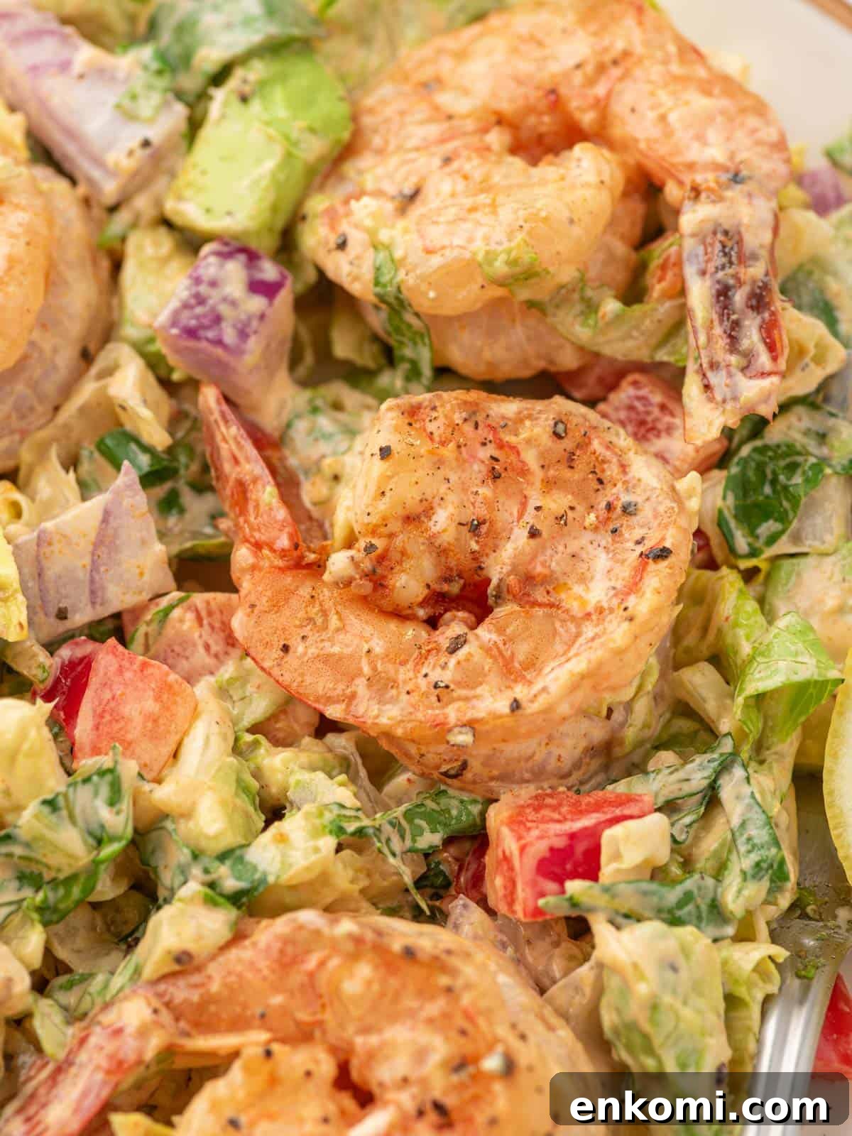 Citrus Shrimp Salad with Crisp Lettuce and Avocado 6 Closeup of shrimp salad with lettuce and avocado.
