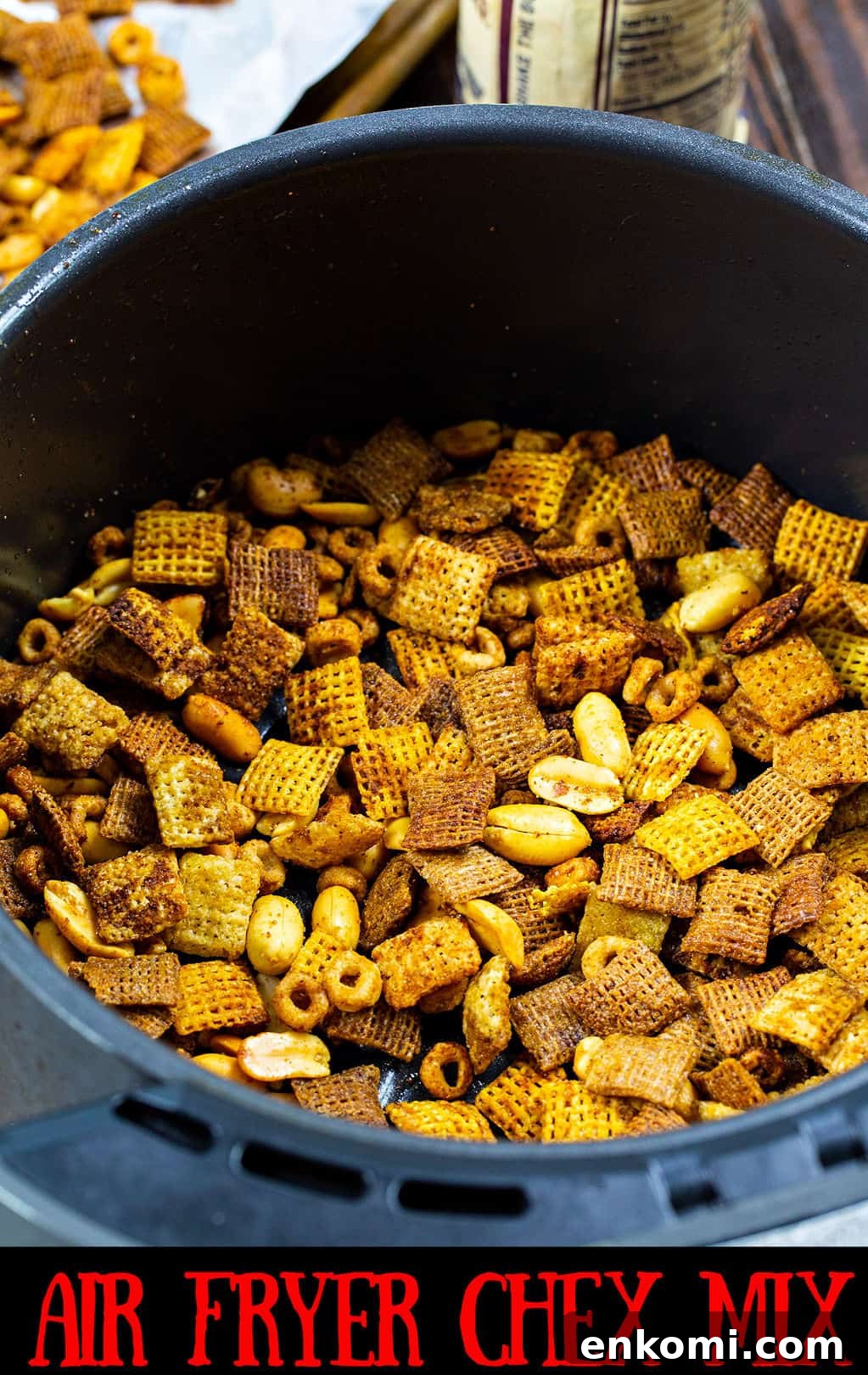 Crispy Air Fryer Chex Mix Recipe for Snack Lovers 4 Chex Mix in air fryer basket.