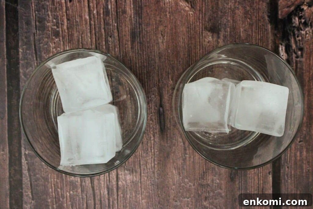 fill lowball glass for crownberry apple with ice