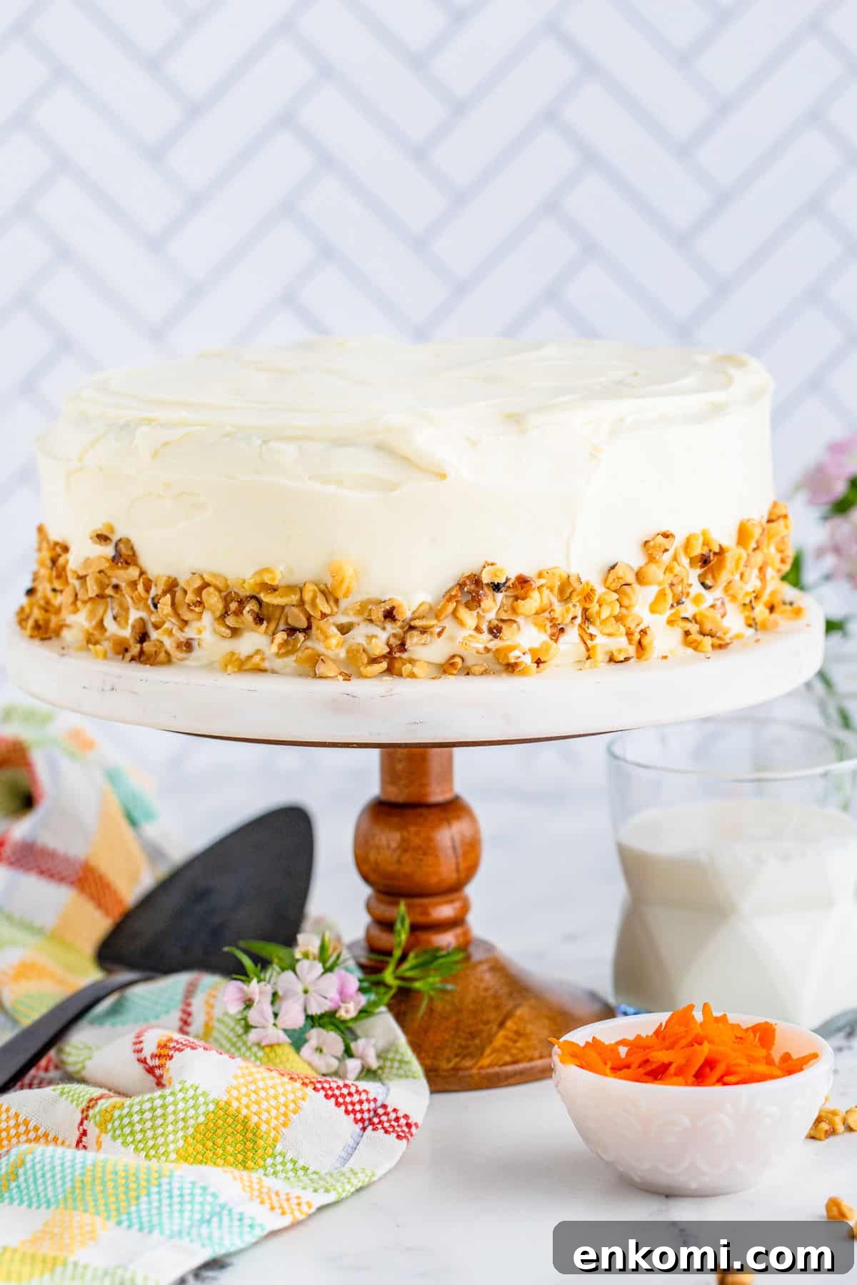 Layered Carrot Cake on cake stand frosted