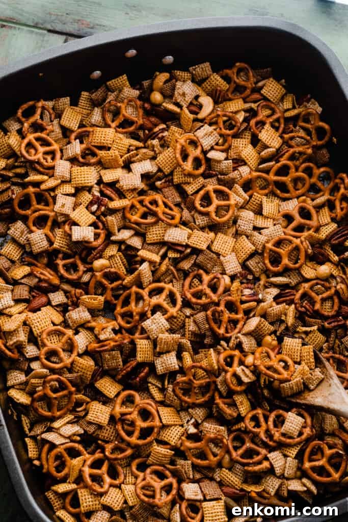 Sweet and Salty Maple Chex Mix Recipe for Snack Lovers 6 A pan of the mixture before being baked.