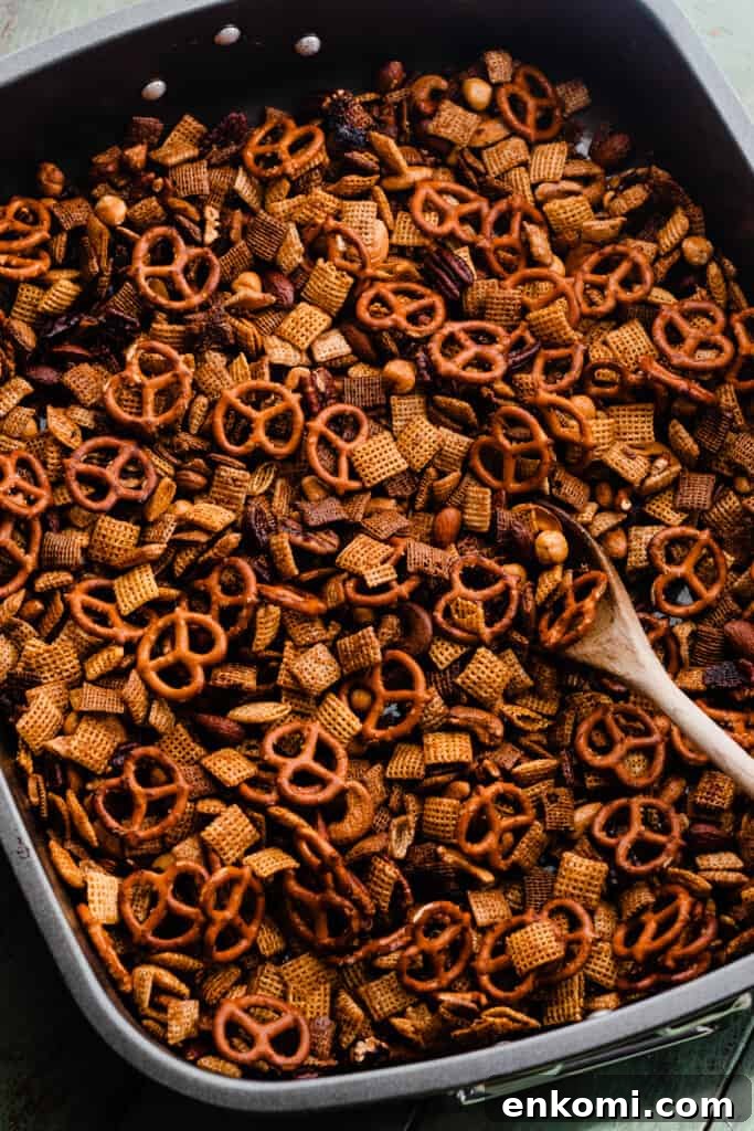 Sweet and Salty Maple Chex Mix Recipe for Snack Lovers 7 A pan of the baked chex mix recipe.