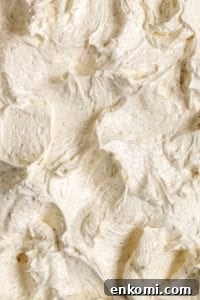 How to Make Silky Swiss Meringue Buttercream for Cakes and Cupcakes 3 Whipped Swiss meringue buttercream with flecks of vanilla.