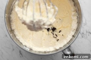How to Make Silky Swiss Meringue Buttercream for Cakes and Cupcakes 6 Vanilla seeds added to Swiss meringue buttercream.