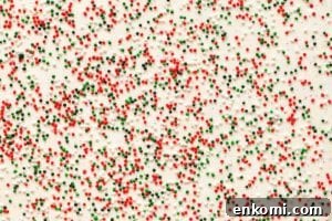 How to Make Silky Swiss Meringue Buttercream for Cakes and Cupcakes 7 Swiss meringue buttercream decorated with sprinkles.