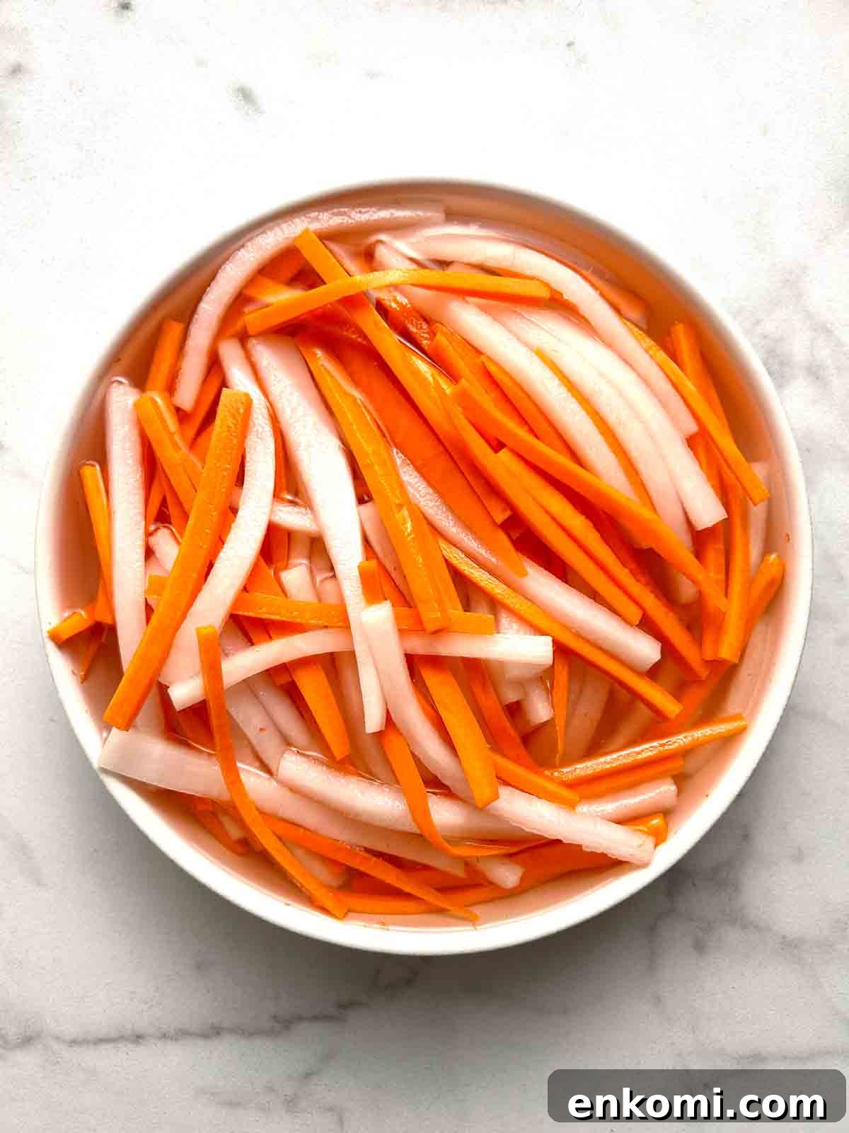 bowl of banh mi pickled daikon and carrots.