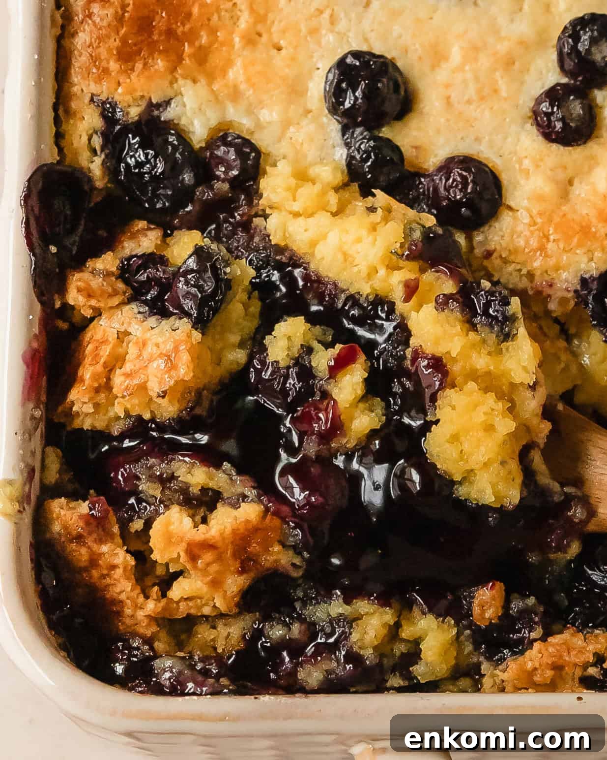 Blueberry dump cake is a quick, easy to make and delicious 5 ingredient blueberry cobbler made with cake mix blueberry pie filling and fresh blueberries. Top this blueberry cobbler dump cake with vanilla ice cream for the perfect easy blueberry dessert.
