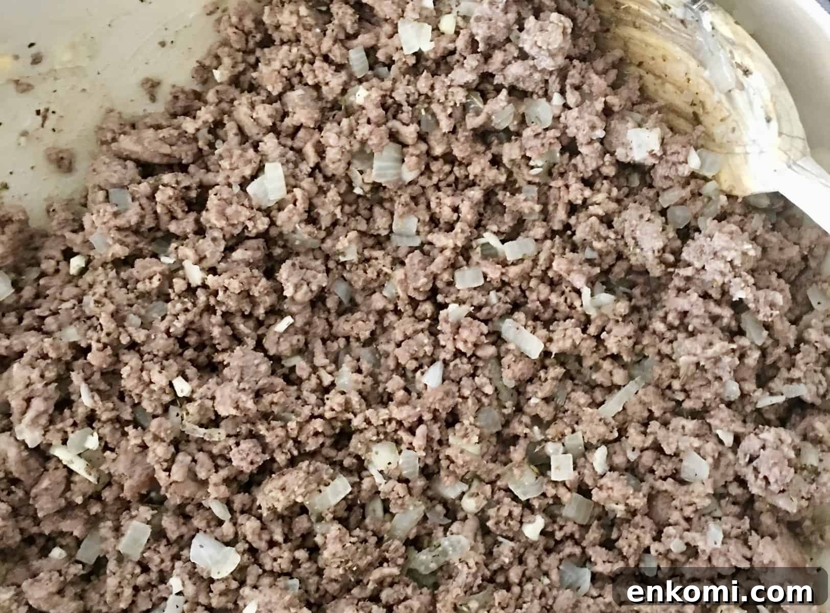 Classic Baked Ziti with Rich Meat Sauce 5 ground beef cooking on stove
