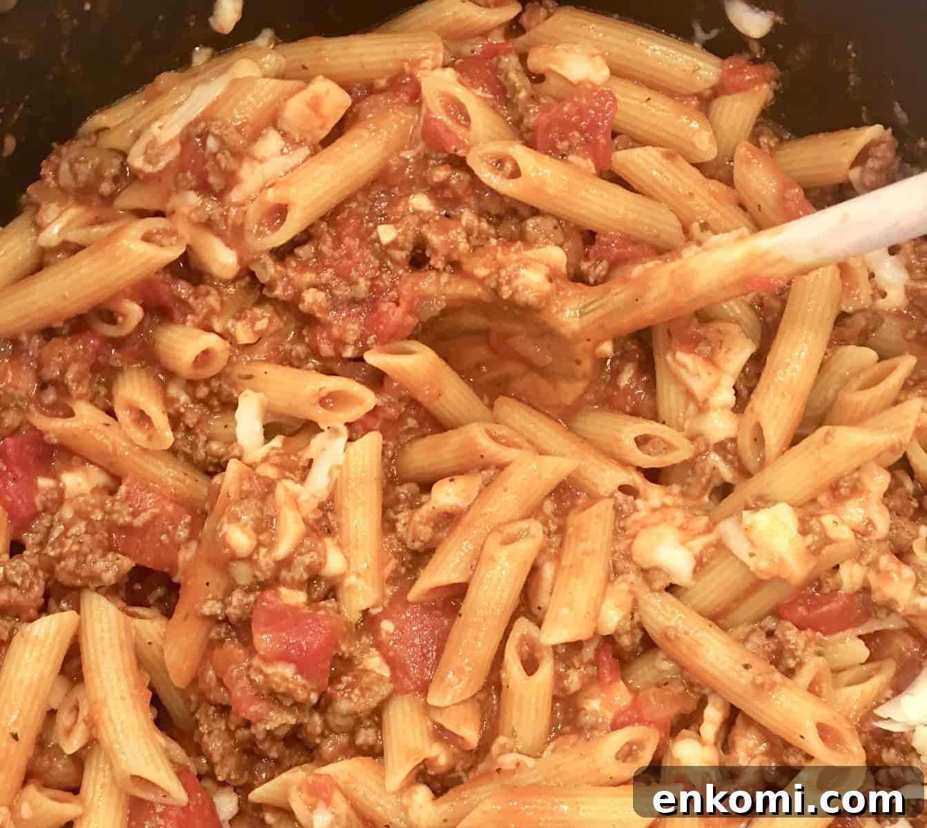 Classic Baked Ziti with Rich Meat Sauce 7 baked ziti with meat sauce in a pot.
