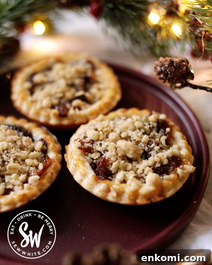 crumble mince pies surrounded by christmas decorations