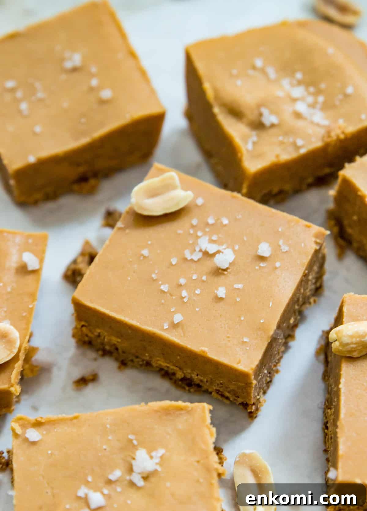 Pieces of no bake peanut butter fudge topped with coarse sea salt.