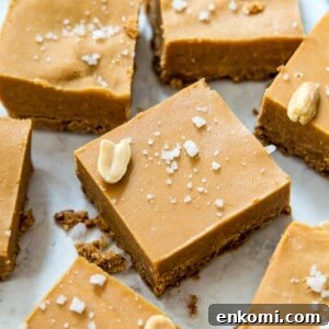 Cut up pieces of no bake peanut butter fudge topped with coarse sea salt.