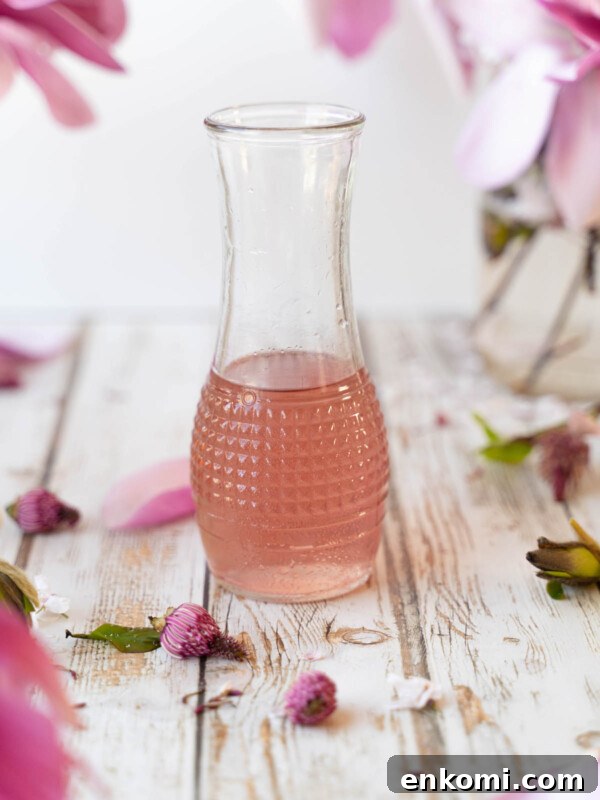 7 Wild Spring Flowers to Forage in the Pacific Northwest 7 Magnolia flower syrup in a glass container