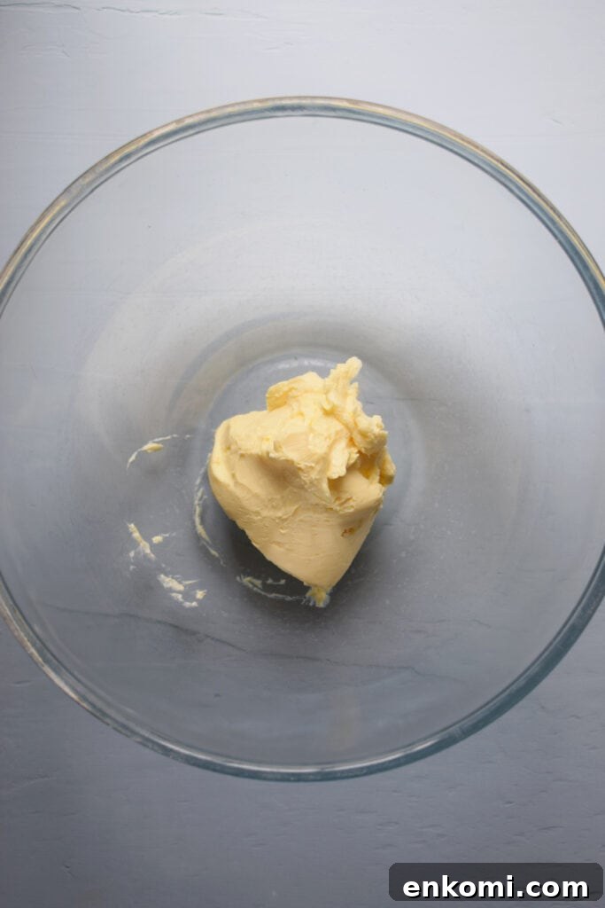 Butter in a mixing bowl.