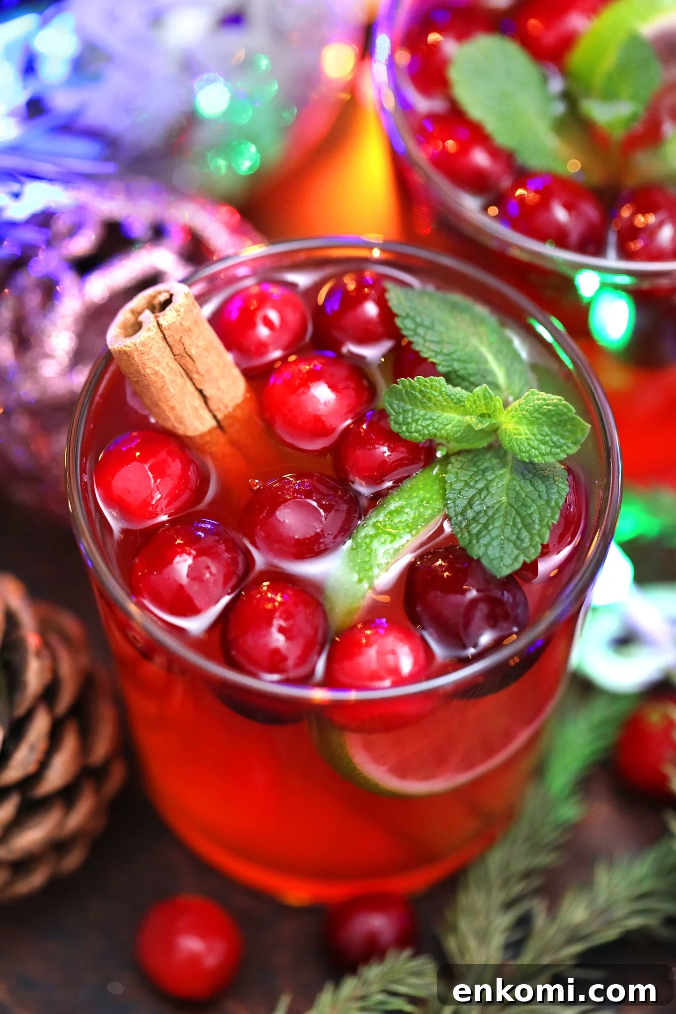 Festive Christmas Punch Recipe for Holiday Parties 6 Christmas Punch is a festive, and refreshing drink that is made with pomegranate, lime, and cranberries, and ready in 5 minutes. #christmaspunch #punchrecipe #christmas #christmasrecipes #sweetandsavorymeals