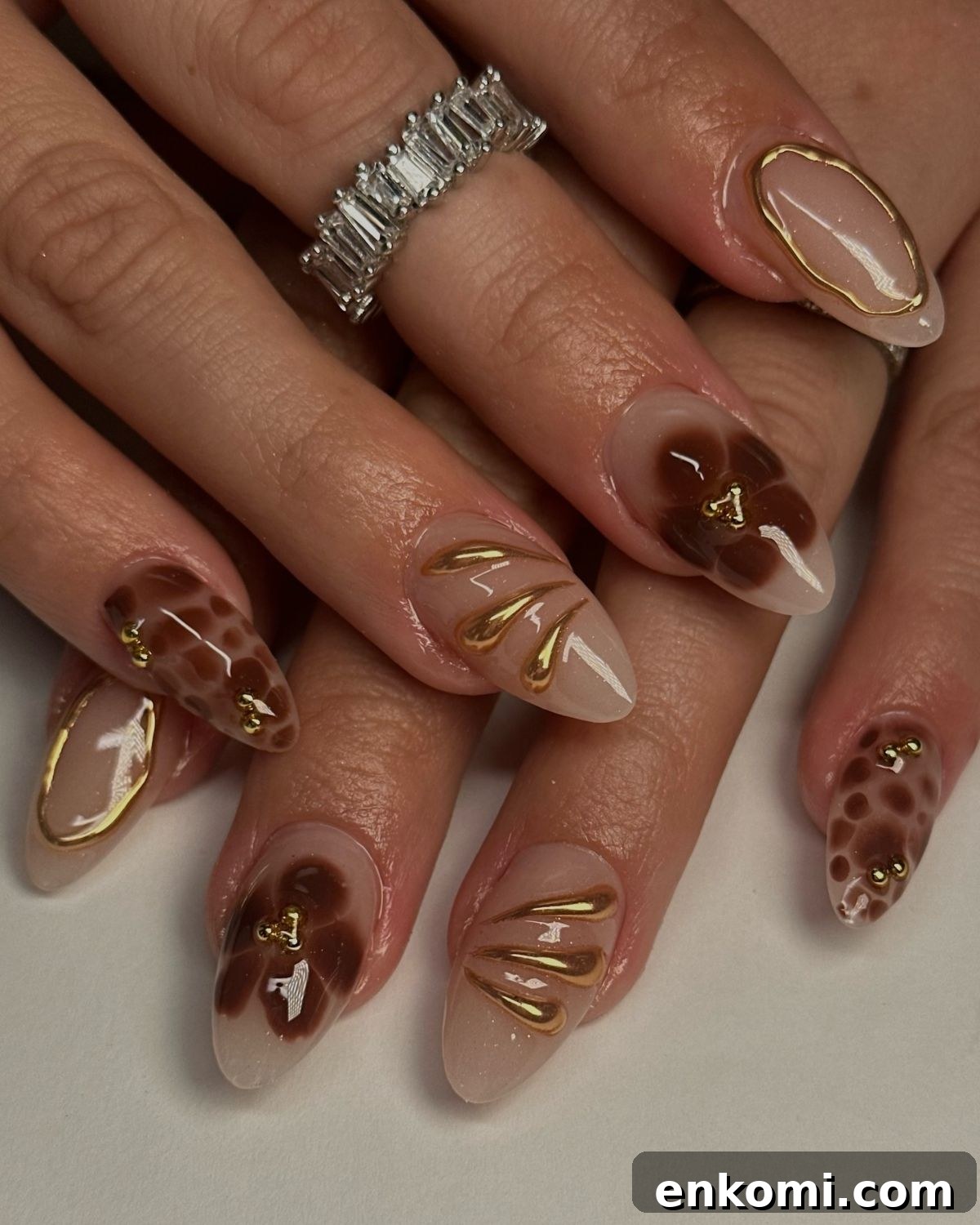 21 Elegant Almond Thanksgiving Nail Designs You’ll Love 6 4. Glitzy Brown and Gold Nail Art