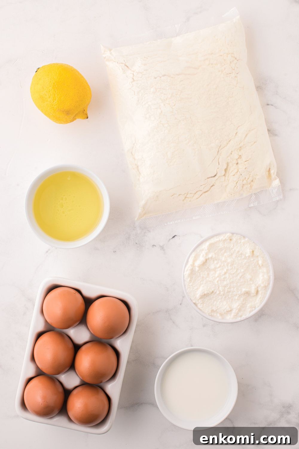 ingredients for the Italian Lemon Ricotta Cake in single serve containers on table 