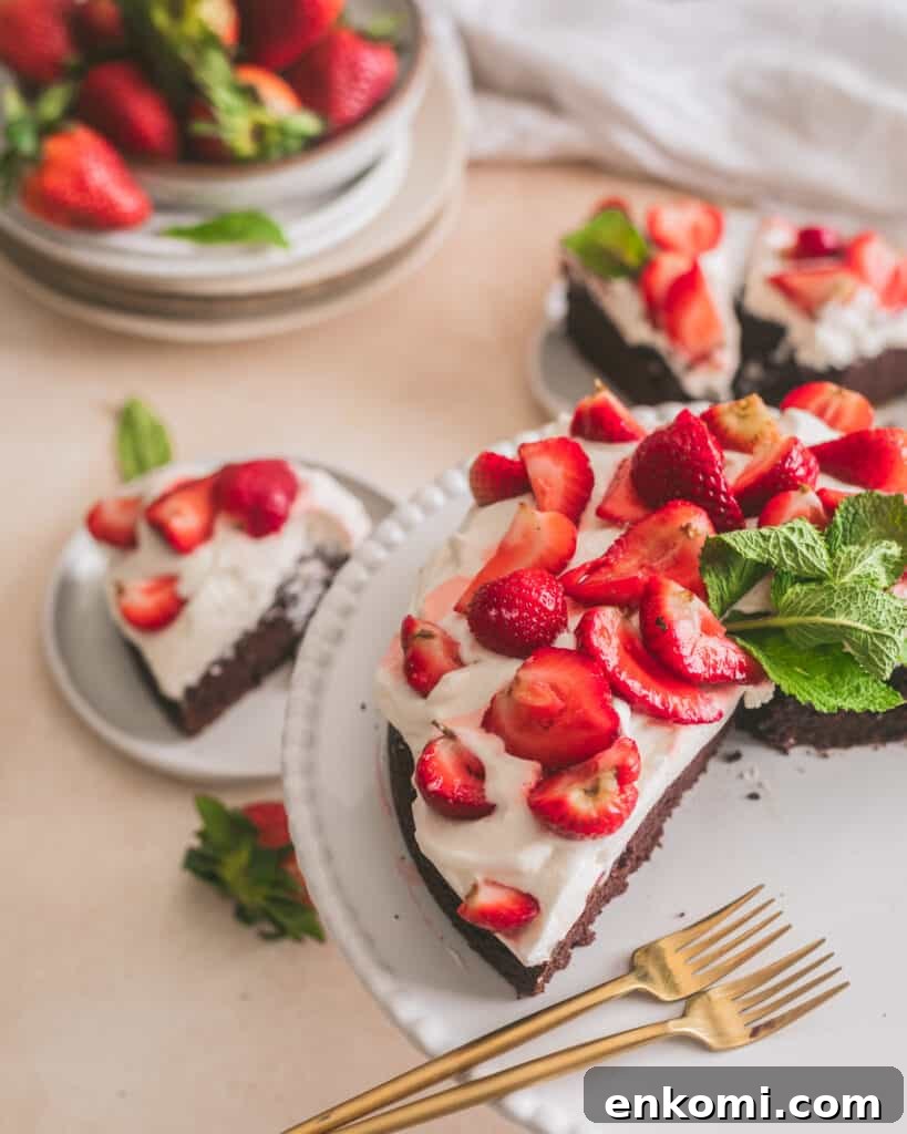 Strawberry and Cream Chocolate Layer Cake Recipe 5 Strawberries and cream chocolate cake on a cake stand