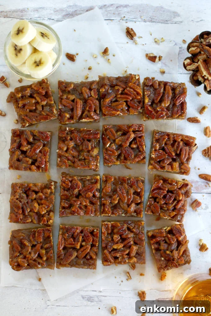 overhead view of cut bars with bananas and pecans