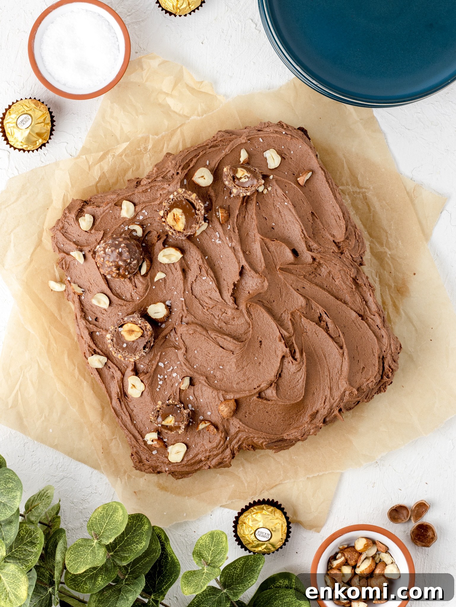 Ferrero Rocher Brownie topped with Ferrero Rochers, hazelnuts, and flaky sea salt.