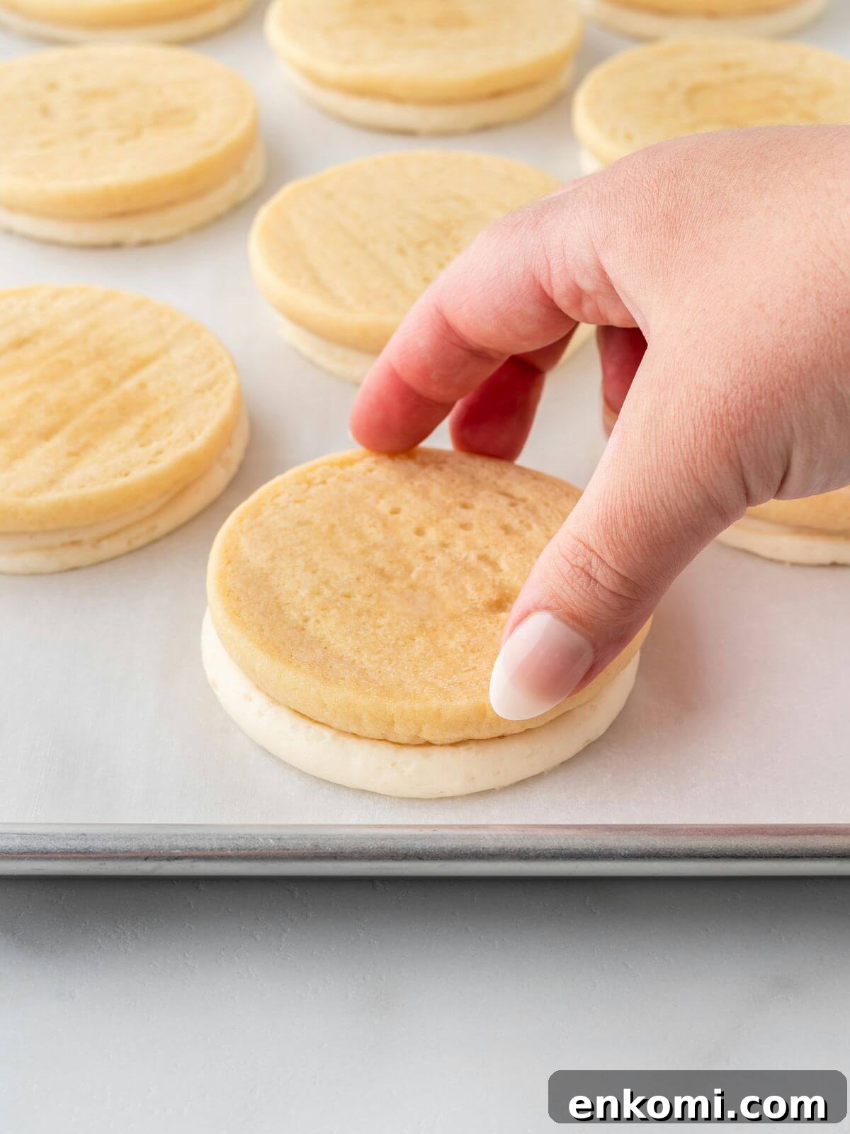 Baseball-Themed Sugar Cookies: Recipes and Decorating Tips 14 sugar cookie flipped upside down on parchment lined paper sheet
