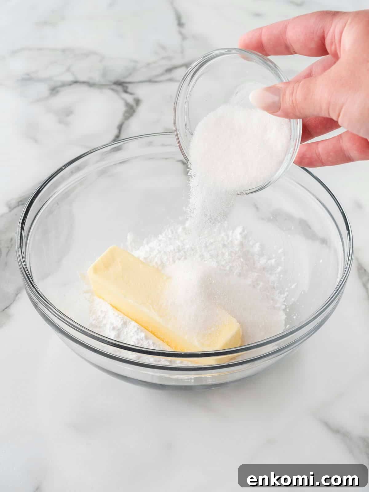 Baseball-Themed Sugar Cookies: Recipes and Decorating Tips 5 mixing sugar and butter in glass mixing bowl for baseball sugar cookies
