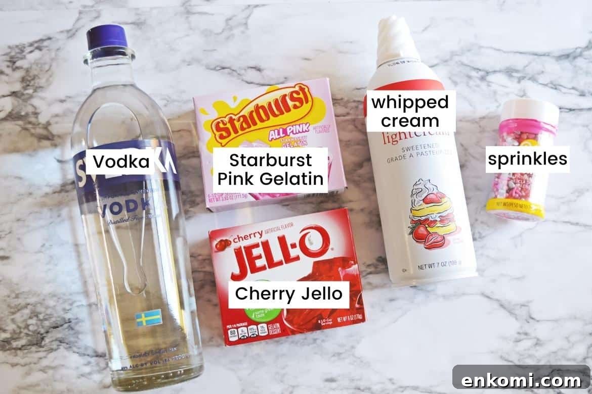 Bottle of vodka, box of pink Starburt gelatin, box of cherry Jello, can of whipped cream, Valentine sprinkles