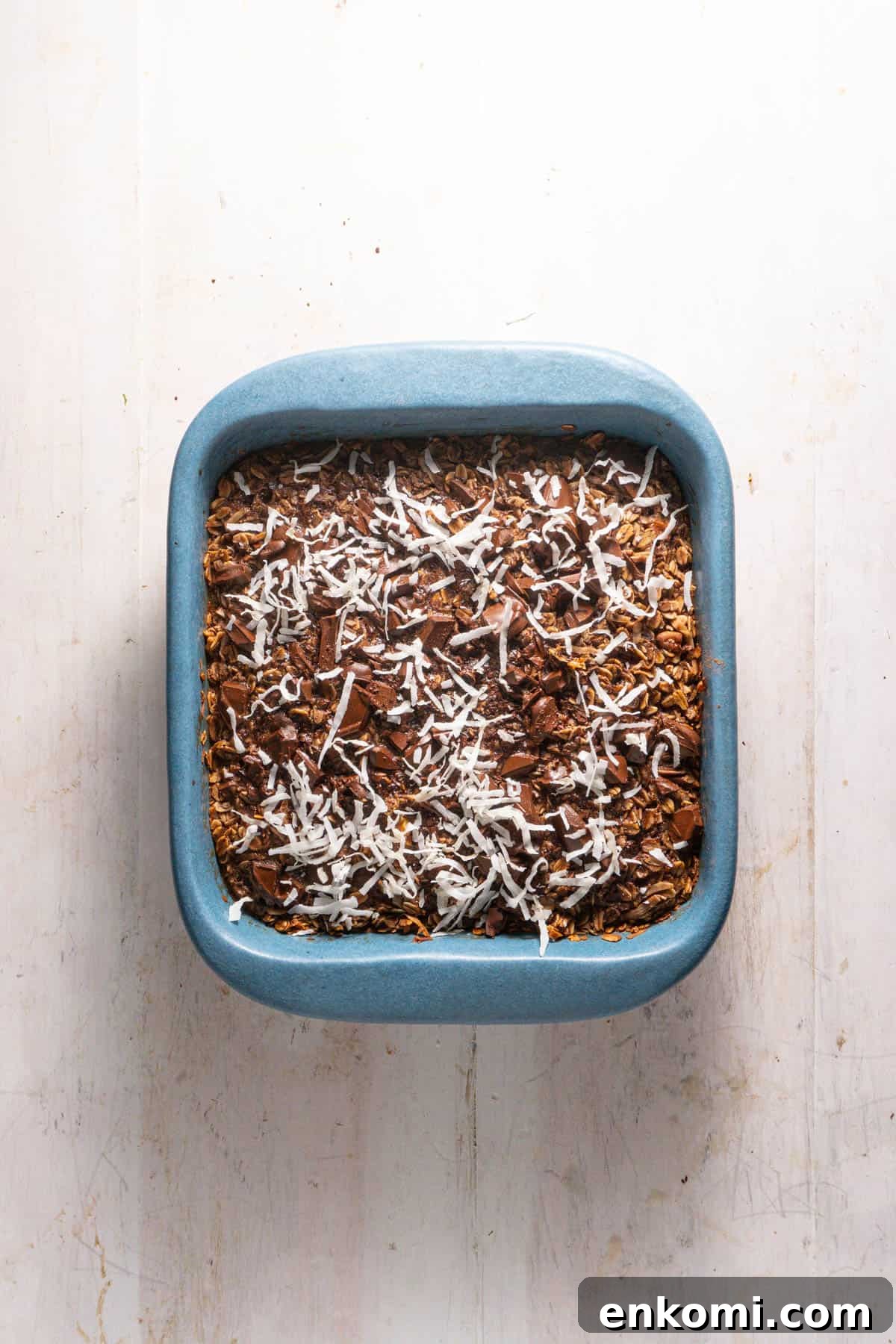 German Chocolate Cake Baked Oatmeal Recipe for Decadent Mornings 8 A German chocolate cake baked oatmeal topped with shredded coconut.