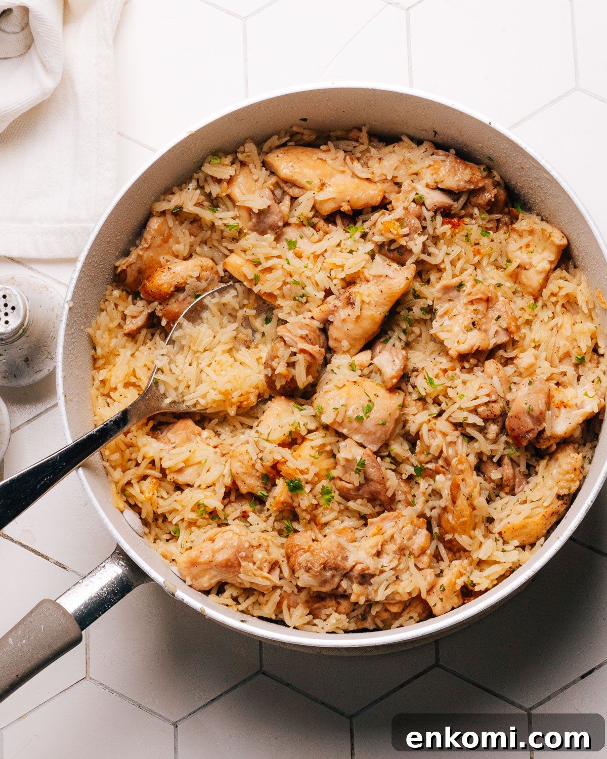 Classic Chicken and Rice Recipe: Flavorful One-Pot Meal 2 Chicken and Rice in a pot.