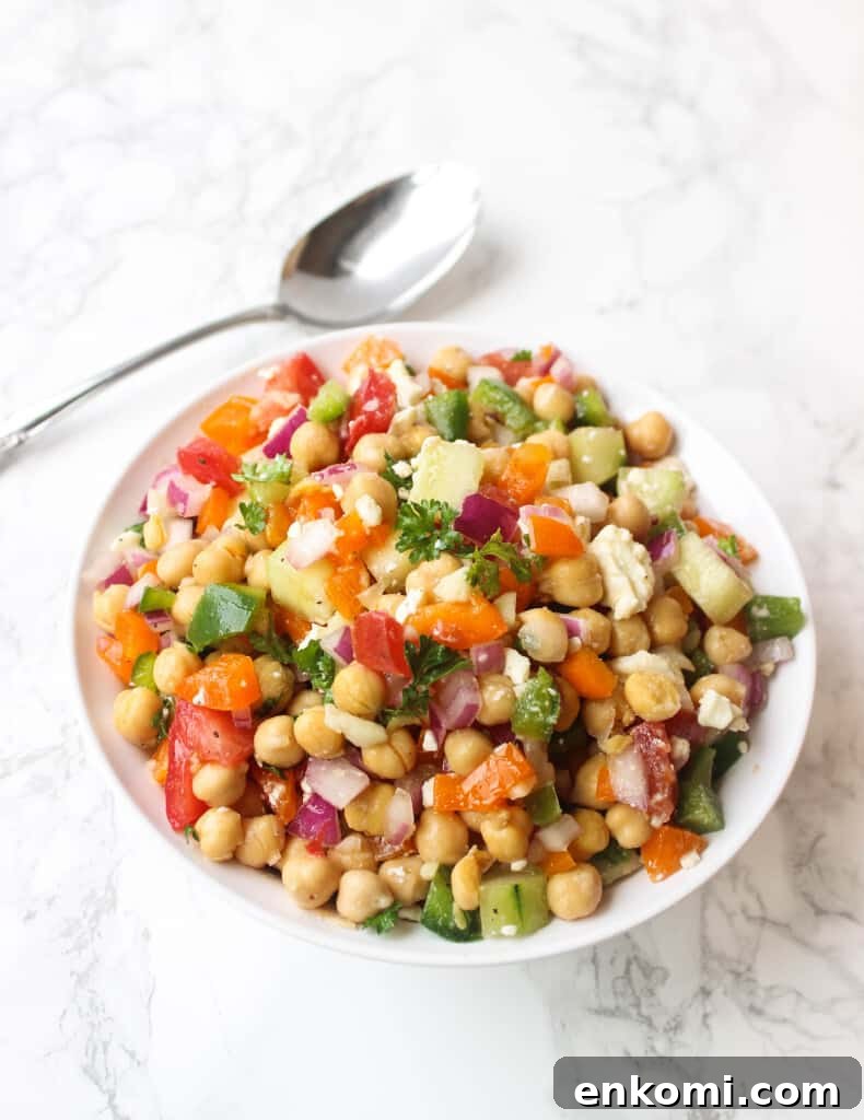 Greek Chickpea Salad LOADED with toppings - it's a simple and healthy meal to whip up! | www.healthy-liv.com Greek Chickpea Salad LOADED with toppings - it's a simple and healthy meal to whip up! | www.healthy-liv.com