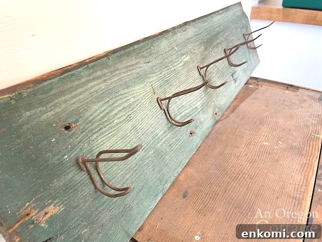 vintage hooks on salvaged board