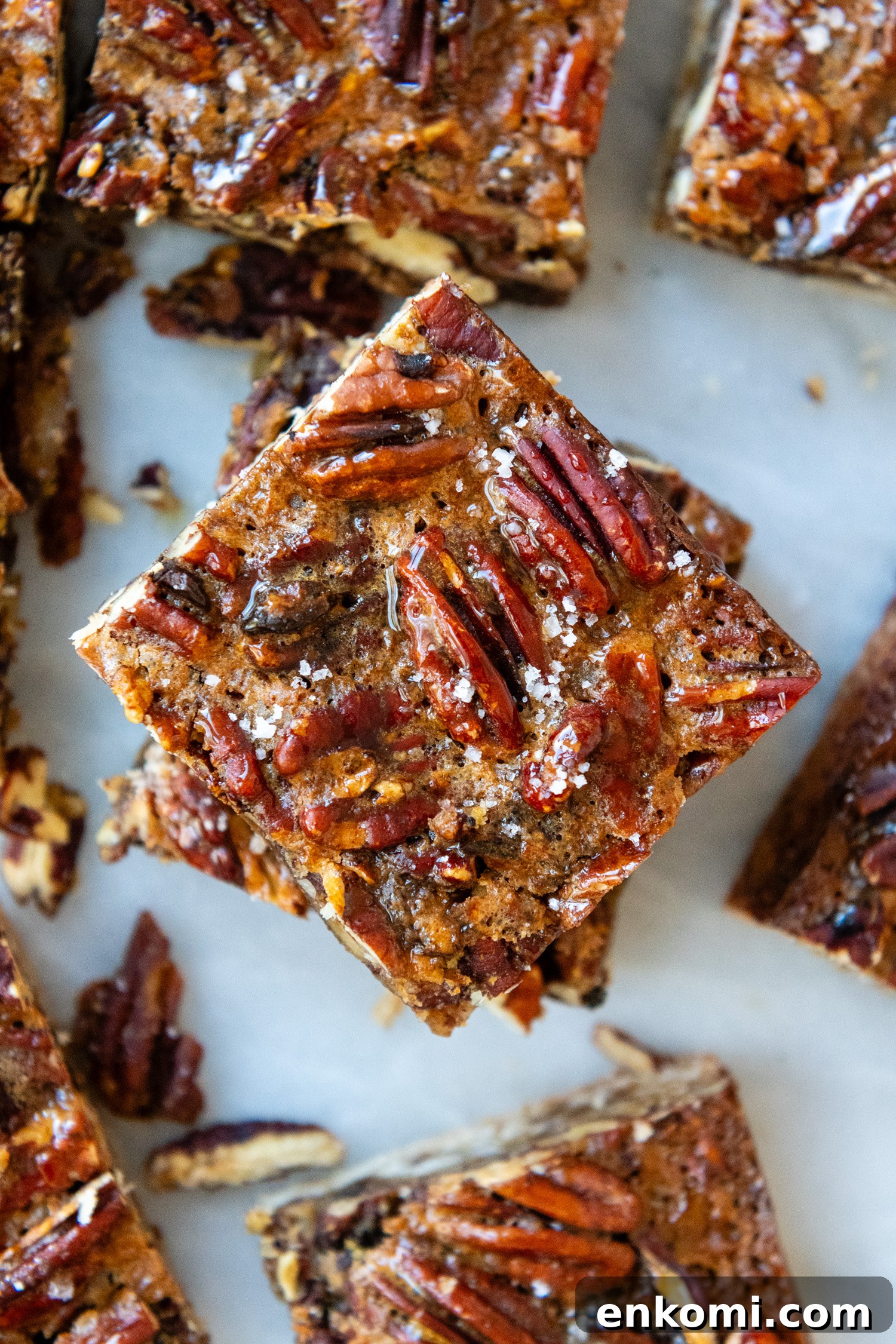 Maple Pecan Pie Bars (Gluten-Free) 8 Overhead shot of bars showing detail of pecan crust.