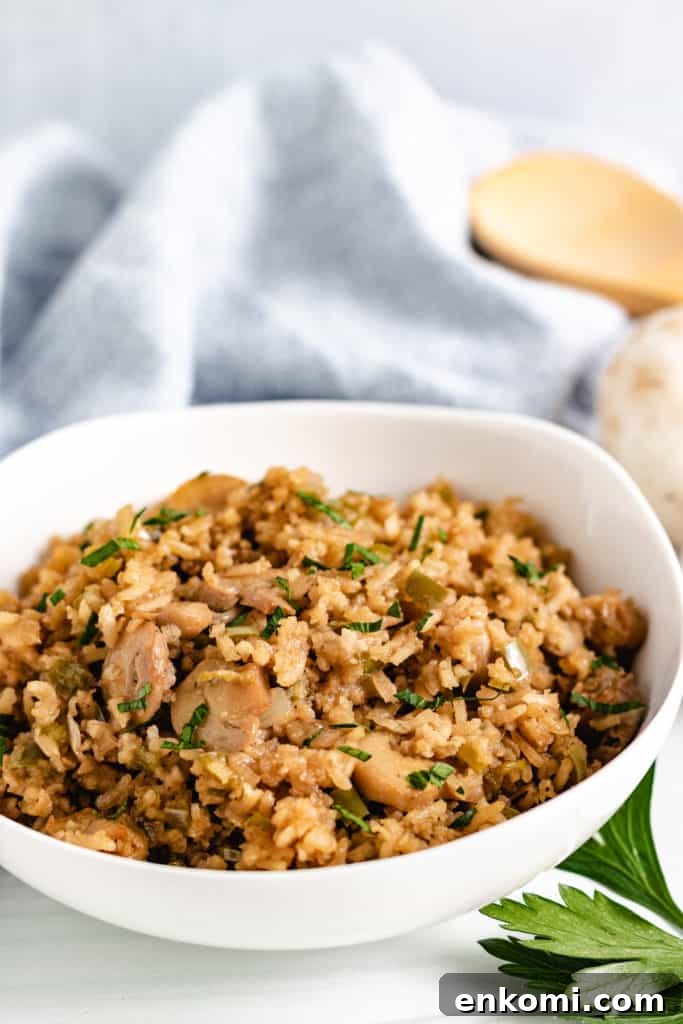 Savory Mushroom Rice Pilaf with Garlic and Herbs 4 Mushroom rice with seasons in a bowl.