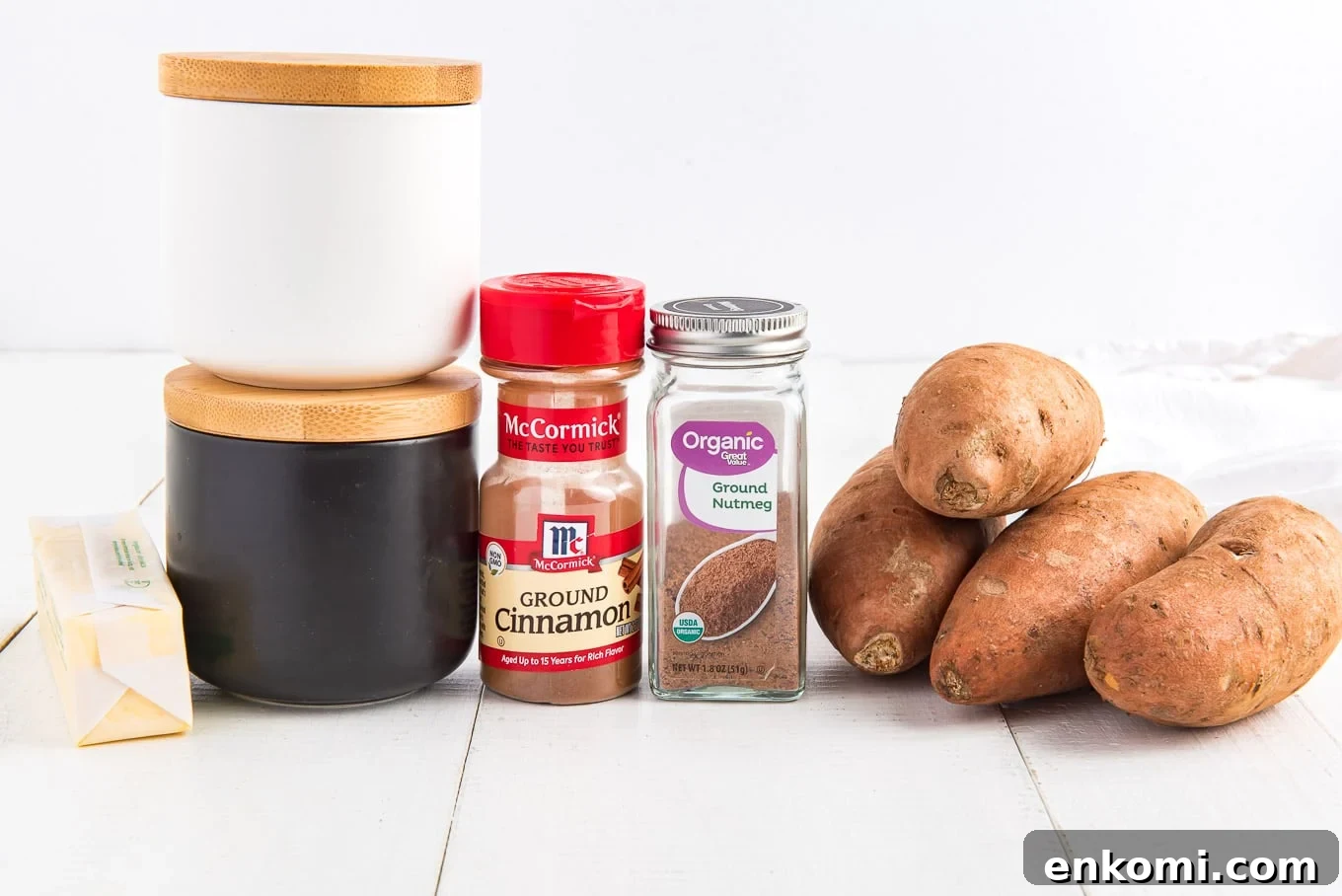 Ingredients to make sweet potatoes in the microwave on the table.