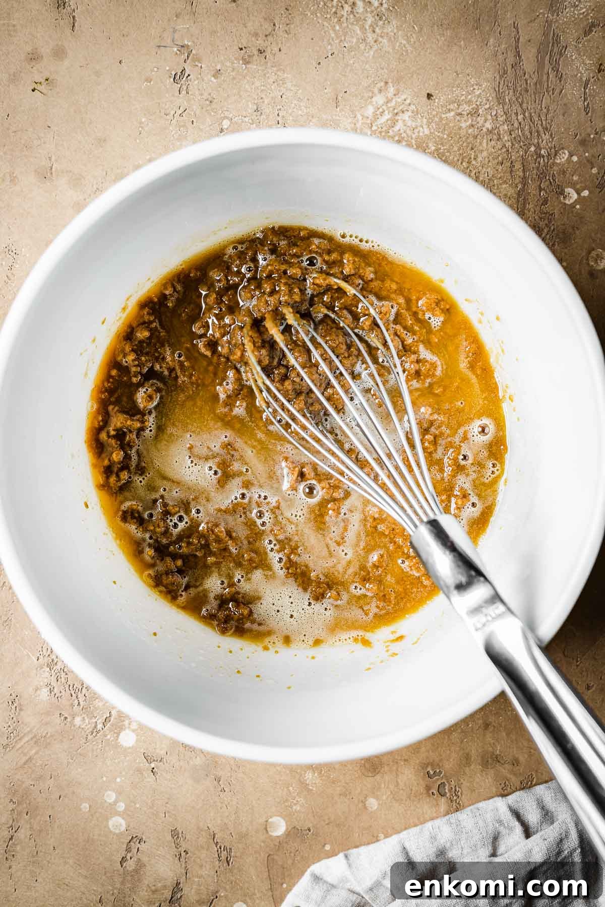 Biscoff Blondie Bars with Cookie Butter Swirl 4 Melted butter, sugar and biscoff spread in a mixing bowl.
