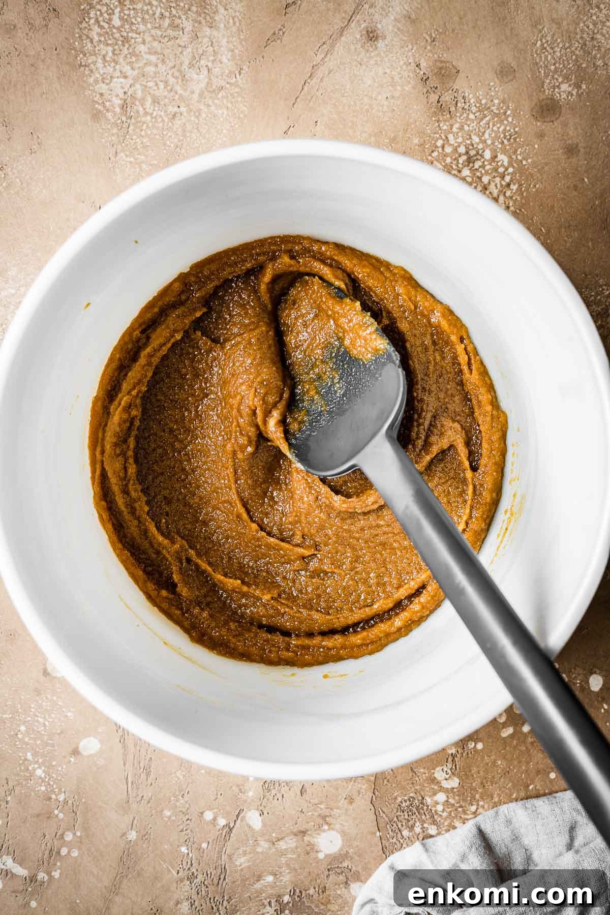 Biscoff Blondie Bars with Cookie Butter Swirl 5 Eggs blended with sugar and butter in a mixing bowl.