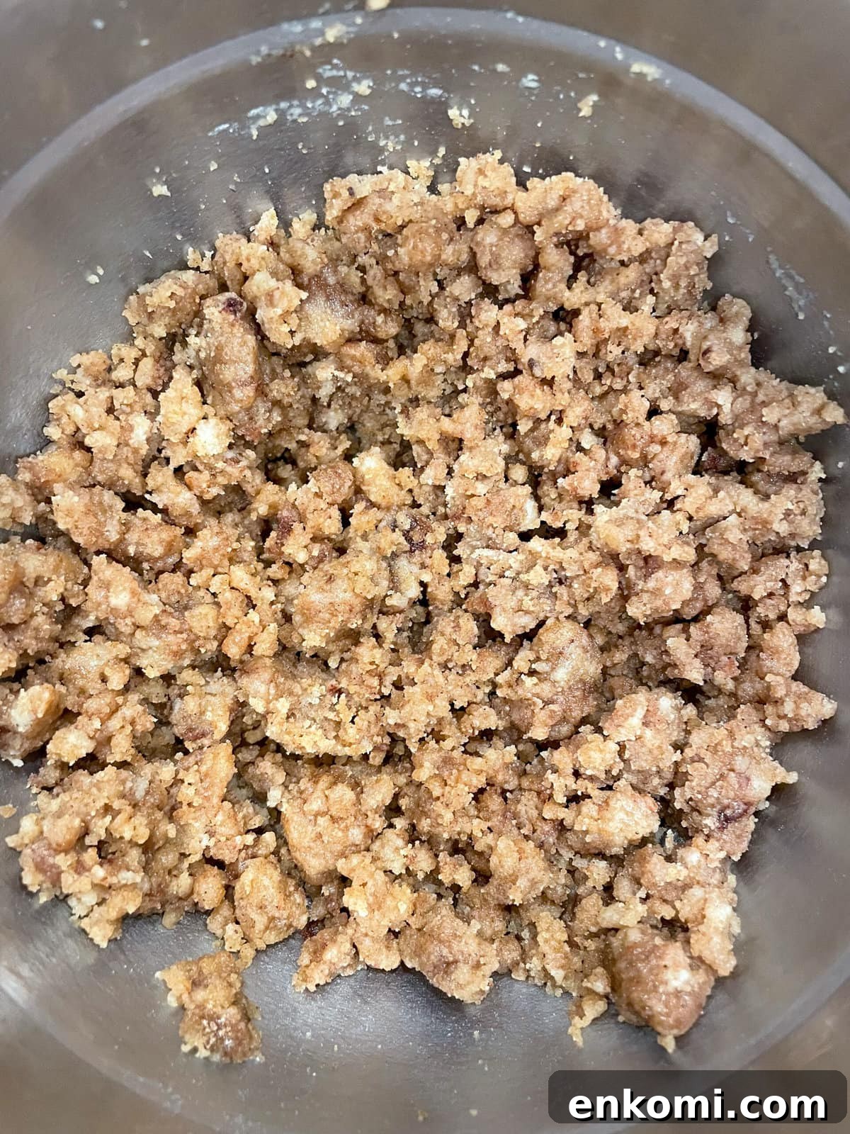 overhead shot of crumb topping in mixing bowl.