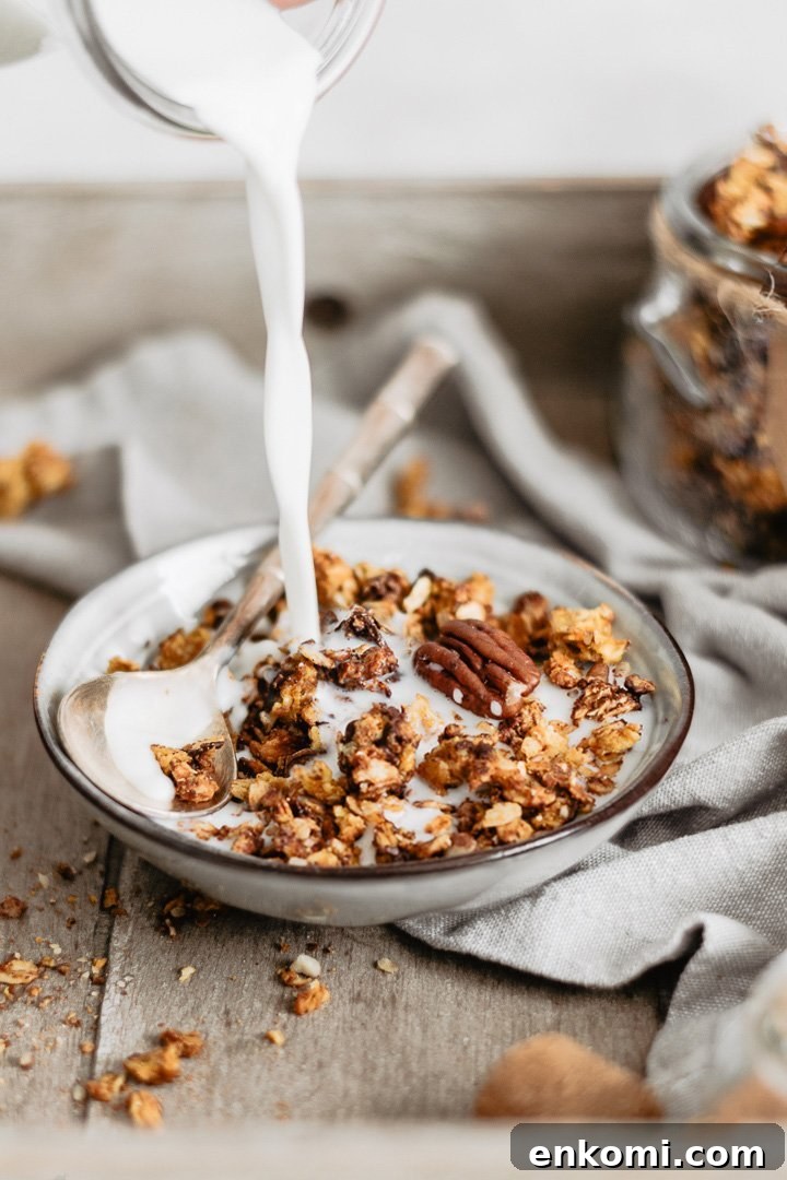 Delicious healthy pumpkin granola with chocolate, cinnamon and pecans