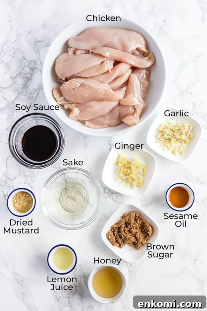 Ingredients to make Chicken Say on a white surface.